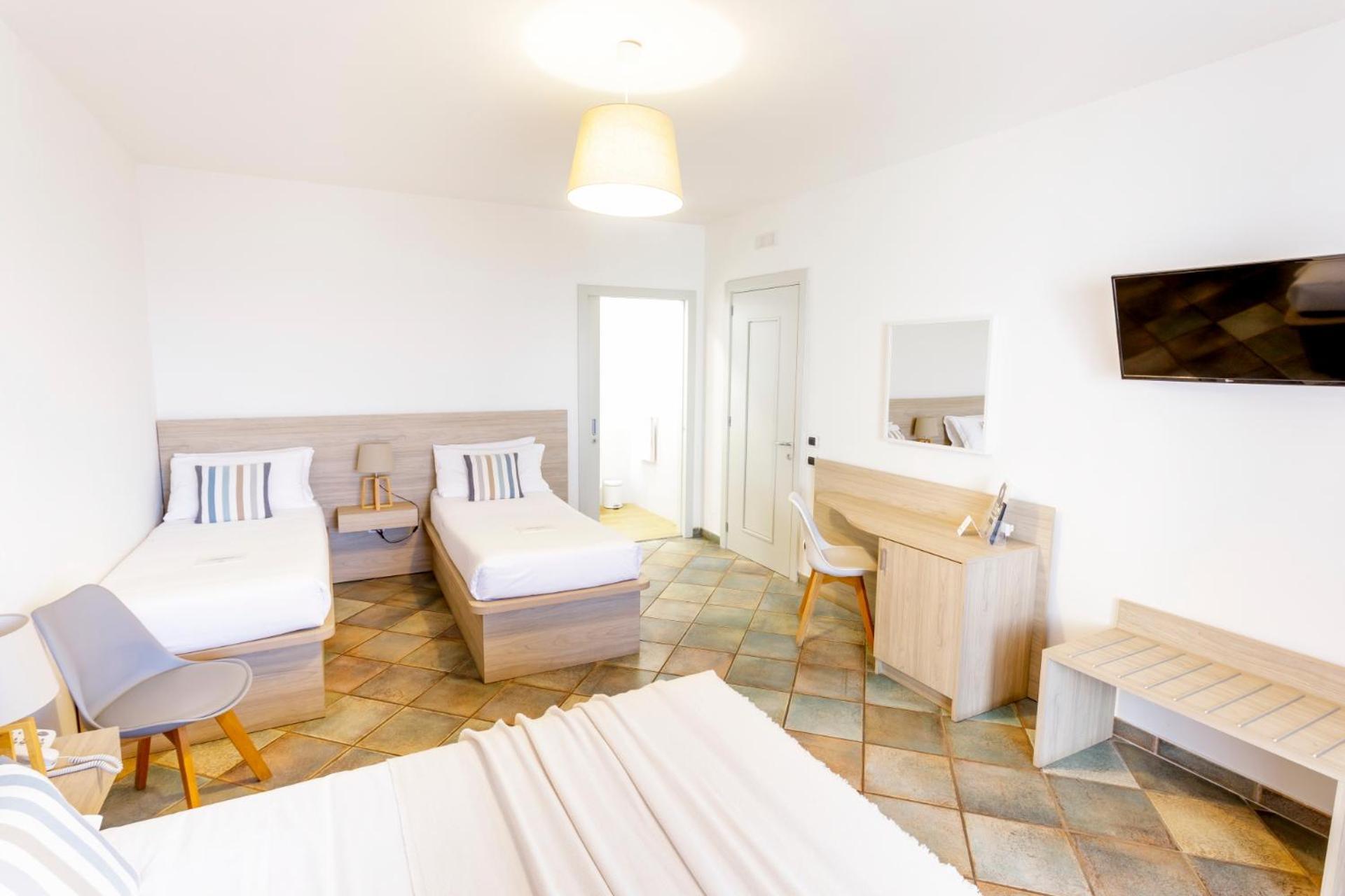 Hotel Corallo Санта-Мария-аль-Баньо Номер фото